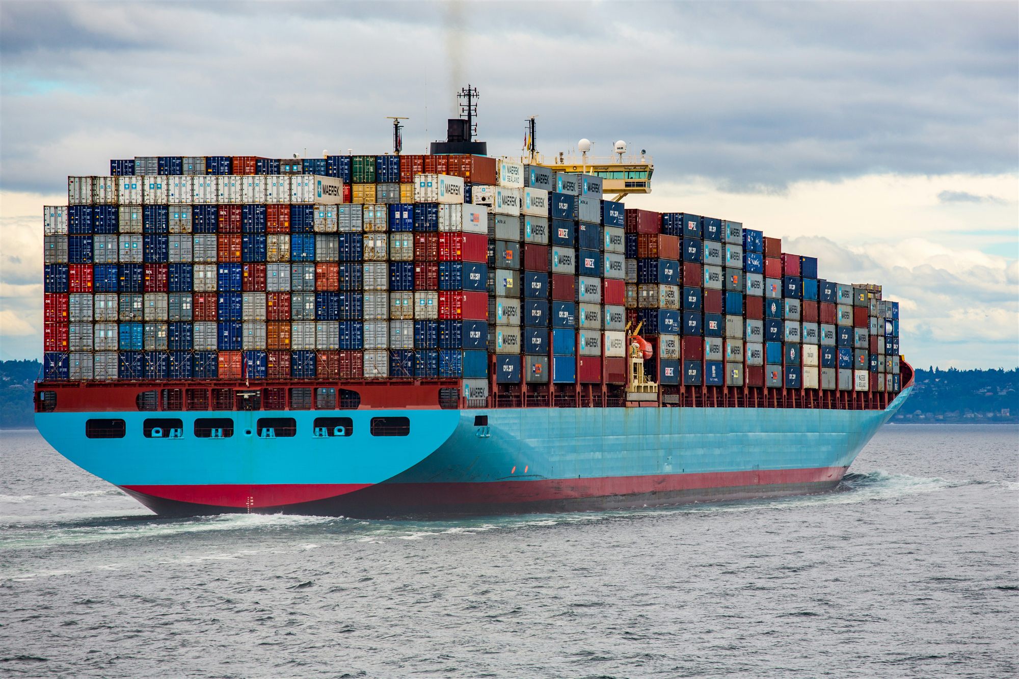 Container vessel carrying cargo at sea